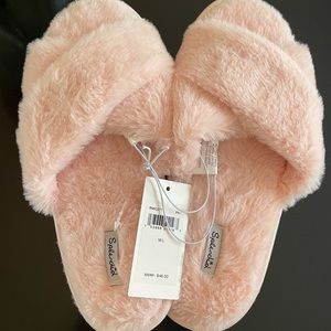 Cozy pale pink slippers